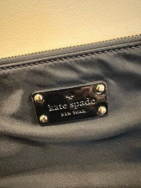 kate spade black tote with gold-tone logo plate